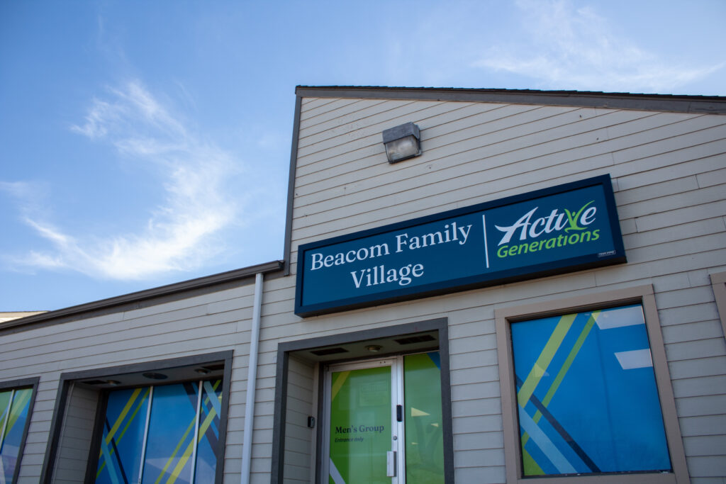 Photo of Beacom Family Village signage on building